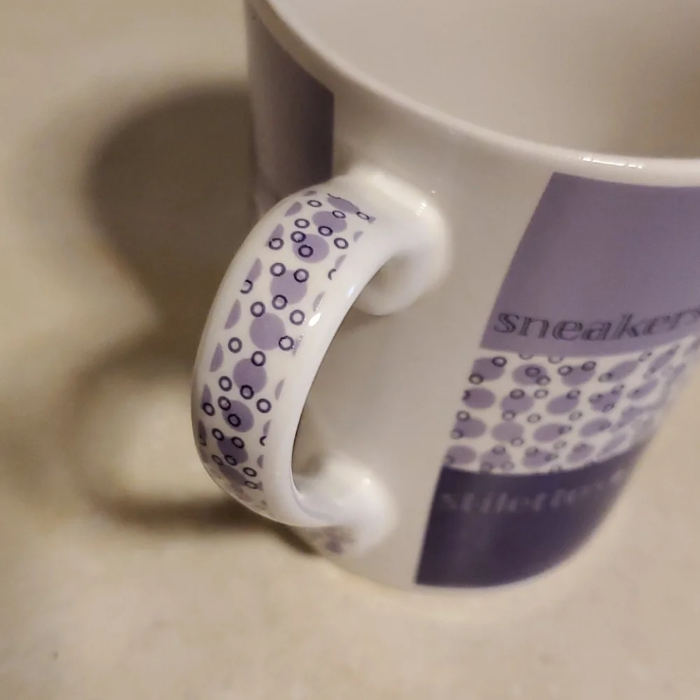 Sneakers/Stilettos coffee mug by Harbor East